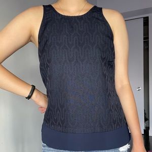 Sleeveless navy blue blouse top with shine pattern